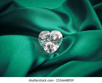 Large Heart Shaped Diamond on Green Silk Background. 