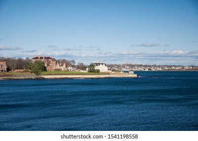 Large Homes Lining The Coast Along The Cliff Walk In Newport Rhode Island In Autumn. 