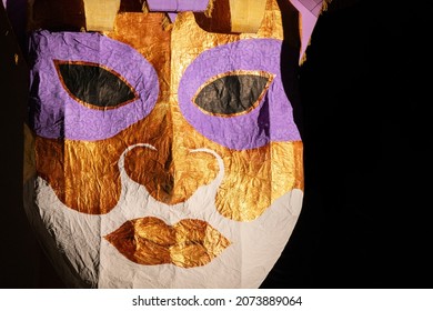 Large Human Face Mask Made Of Gold Foil And Papier-mâché.