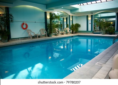 A large indoor pool with clear blue water