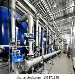 Large industrial boiler room, shiny pipes and details close-up. Industry, technology, special equipment, water treatment, biotechnology, chemistry, ecology, environmental damage and conservation - Shutterstock ID 135171158
