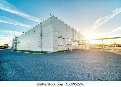 Large industrial building, hangar. Early morning, dawn. - Shutterstock ID 1808952940