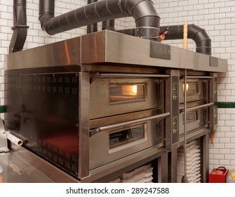 Large Industrial Pizza Oven In Restaurant