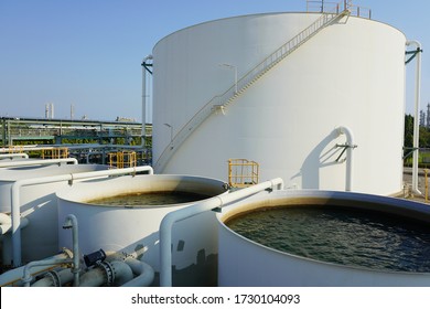 Large Industrial Tanks Or Spherical Tanks For Filter And Wastewater Treatment System Of Petrochemical Plant, Oil And Gas Or Water In Refinery Or Power Plant For Industrial Plant On Blue Sky Background