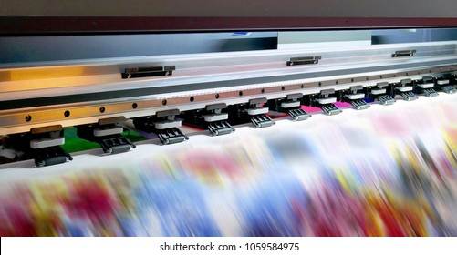 Large Inkjet Printing Machine During Production On Vinyl Banner.