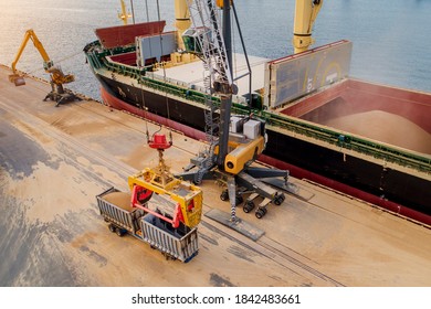 Large International Transportation Vessel In The Port, Loading For Export In The Sea Waters.