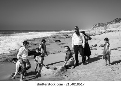 Large Jewish family having fun on the sea coast during the weekend.Israel Ashkelon April 2022