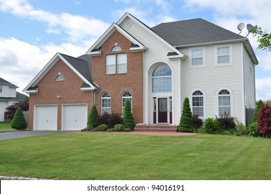 Large  Landscaped Two Car Garage Luxury Suburban Home In Residential District