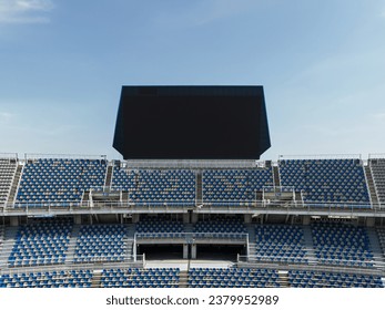 Large LED screen in stadium with empty seats. Scoreboard for sport matches - Powered by Shutterstock