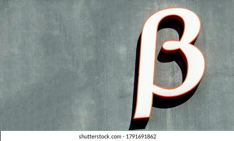 large letter beta on a grey background