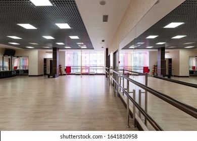 Large And Light Hall With Mirrors, Music, Equipment For Dancing, Sports. Group Fitness Room. Modern Interior Design. Fitness Workout. Fitness Gym Background. Gym Equipment Background. Empty Space.