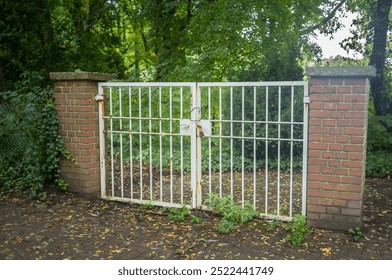 large locked old garden gate