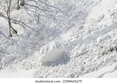 Large lump of snow at bottom of avalanche