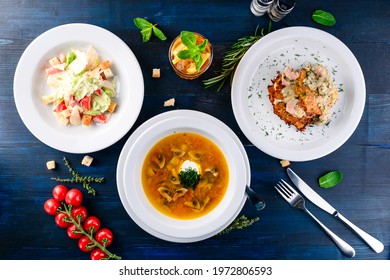 Large Lunch Set Of Three Courses Soup, Second Course And Salad, Top View Of A Three Course Set Menu Served On Wooden Table, Business Lunch Set Made Of Three Meals