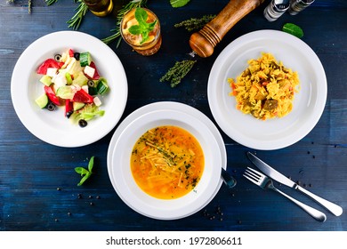 Large Lunch Set Of Three Courses Soup, Second Course And Salad, Top View Of A Three Course Set Menu Served On Wooden Table, Business Lunch Set Made Of Three Meals