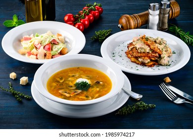 Large Lunch Set Of Three Courses Soup, Second Course And Salad, Top View Of A Three Course Set Menu Served On Wooden Table, Business Lunch Set Made Of Three Meals