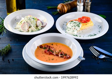 Large Lunch Set Of Three Courses Soup, Second Course And Salad, Top View Of A Three Course Set Menu Served On Wooden Table, Business Lunch Set Made Of Three Meals