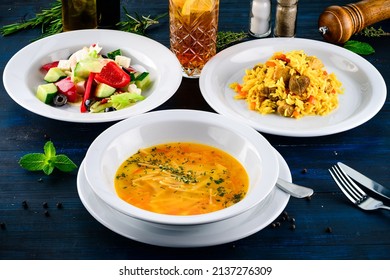 Large Lunch Set Of Three Courses Soup, Second Course And Salad, Top View Of A Three Course Set Menu Served On Wooden Table, Business Lunch Set Made Of Three Meals