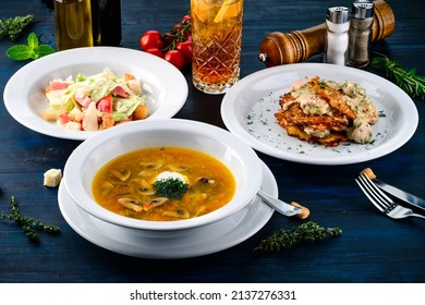 Large Lunch Set Of Three Courses Soup, Second Course And Salad, Top View Of A Three Course Set Menu Served On Wooden Table, Business Lunch Set Made Of Three Meals