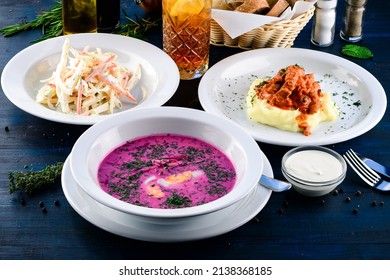 Large Lunch Set Of Three Courses Soup, Second Course And Salad, Top View Of A Three Course Set Menu Served On Wooden Table, Business Lunch Set Made Of Three Meals