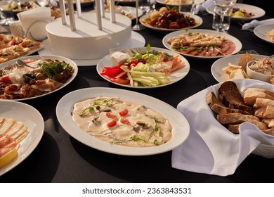 large lunch set of three courses soup, second course and salad, Top view of a three course set menu served on wooden table, business lunch set made of three meals