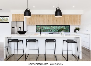 Large luxury Australian kitchen with marble island bench