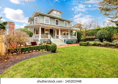 Large Luxury Green Craftsman Classic American House Exterior.