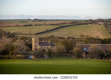 Large meadows, rolling hills and woods and villages in South Downs National Park, Brighton, UK