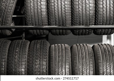 Large Metal Tires Rack. Modern Car Tire Service And Sale.