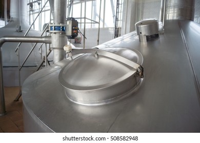 Large Metal Tub At The Plant, Covered With A Lid