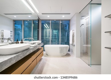 Large Modern Bathroom Interior With Luxury Fittings And Stand Alone Bathtub. PERTH, WESTERN AUSTRALIA. Photographed: January, 2019.