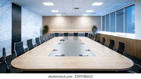 Large modern conference room with stylish wooden furniture. Meeting room with big wooden table.  - Powered by Shutterstock