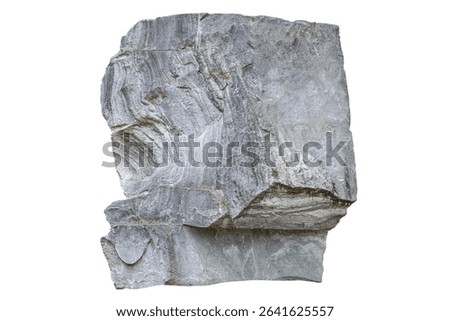 Large monolithic multilayer light gray stone pedestal granite marble block isolated on white background closeup