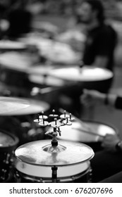 A Large Musical Plate With A Set Of Small Ones In A Drum Set. 