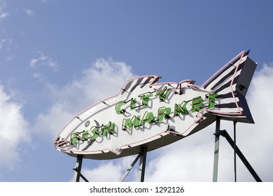 The Large Neon Sign At The Pike Place Public Market Of A Fish