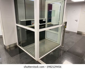 Large new inclusive elevator in the metro or shopping center for people with disabilities and people with disabilities for a barrier-free city environment.