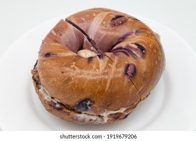 Large New York City Blueberry Bagel Filled With Strawberry Cream Cheese