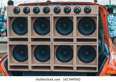 A Large Number Of High And Low Frequency Speakers In Trunk Of Car. Loud Music And Car Audio.Festival, Exhibition Of Car Audio.