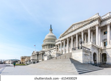 A large number of stairs lead up to the United States Senate portion of the United States Capitol Building in Washington DC.