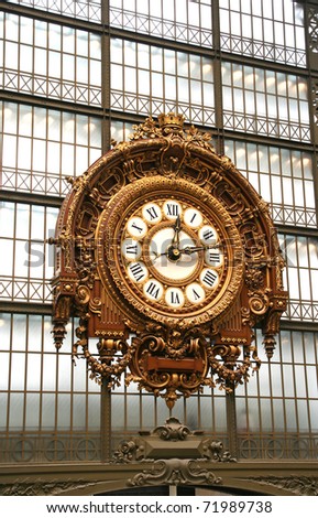 Large ornate railway clock in Paris