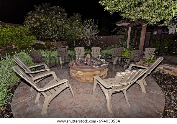 Large Outdoor Fire Pit Night Surrounded Royalty Free Stock Image