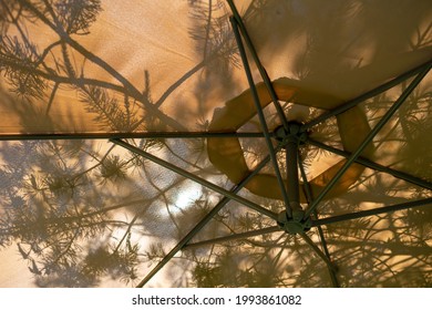 Large Outdoor Garden Umbrella Open From The Cream-colored Sun