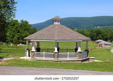 Large Oval Gazebo At A Park.