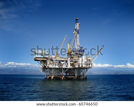 Large Pacific Ocean offshore oil rig drilling platform off the southern coast of California. Circa 2007.