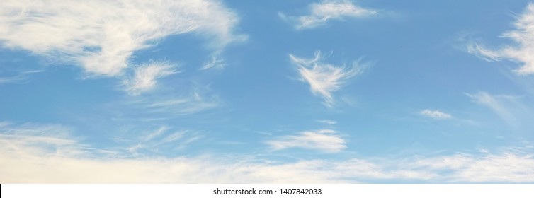 Large Panorama Of Blue Daytime Sky With Clouds