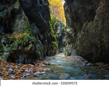 Large panorama of a river flowing through a canyon