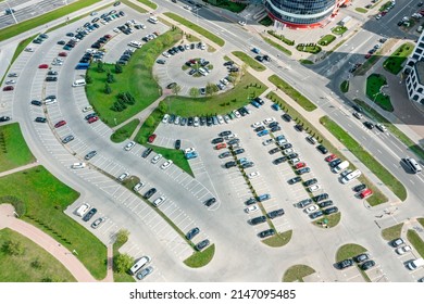 Large Parking Lot In Residential Area. Aerial View From Flying Drone.