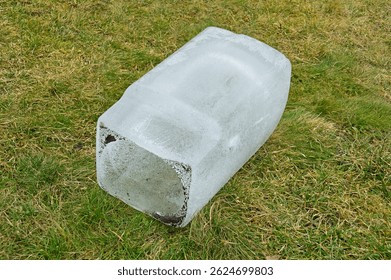 A large piece of ice in the shape of a rectangular parallelepiped