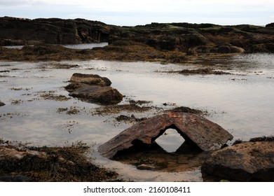 Large Piece Of Submarine Ship Wreck Washed Up Into Rock Pools By Storms