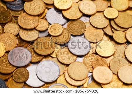 A large pile of coins from a Ukrainian bank. Ukrainian type coins: Kopeck. Concept for banking affairs, taxes, debt,